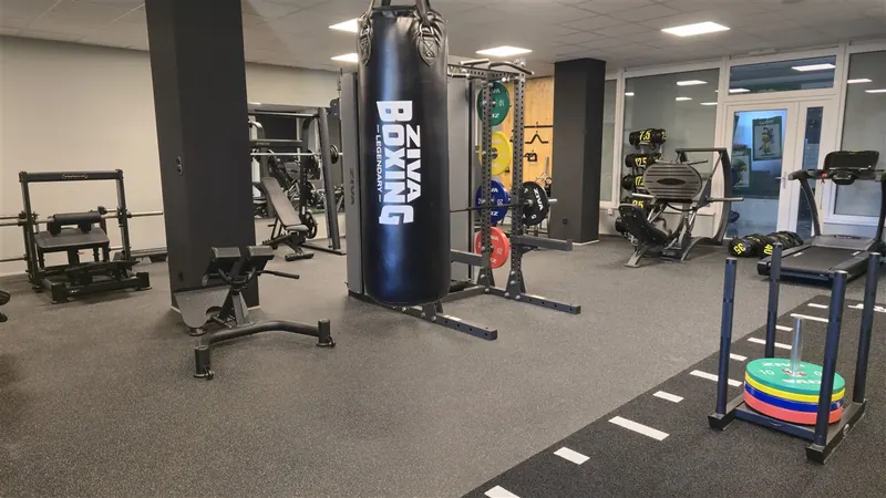 Běžecký pás a funkční zóna v 01.fitness